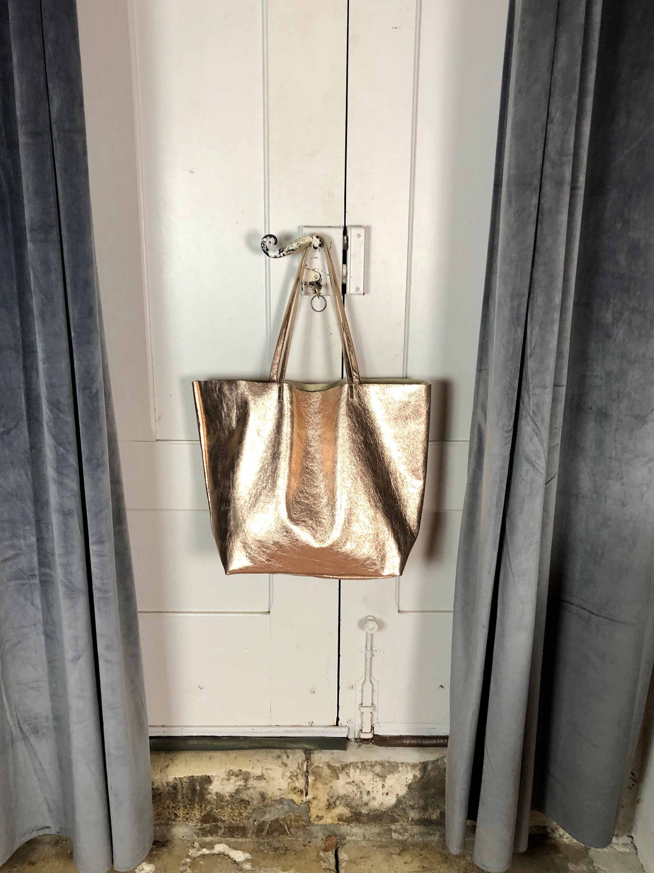 Rose gold leather online handbag